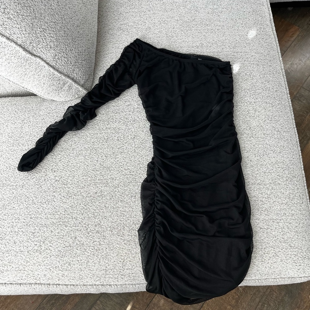 A right arm sheer sleeve black formal dress from Windsor. Size 2!
